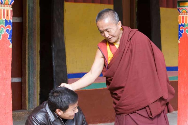 A0EAHJ Monk with lay friend- Drepung Monastery Lhasa. Image shot 11/2006. Exact date unknown.